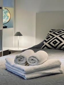 Un pat sau paturi într-o cameră la Zentrum: Prater, Messe, WU