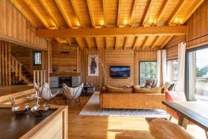 Posedenie v ubytovaní Chalet Luxe spacieux, Piscine chauffée, vue lac et montagnes, proximité immédiate pistes