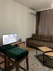 Apartman Ajs tesisinde bir oturma alanı