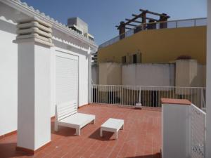 Ein Balkon oder eine Terrasse in der Unterkunft Apartamentos San Miguel