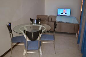 TV a/nebo společenská místnost v ubytování Plateau Apartment