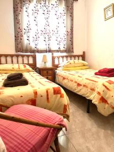 A bed or beds in a room at Beautiful Air Conditioned bungalow - Alkabir Még 37 kép