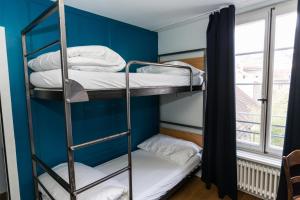 Poschodová posteľ alebo postele v izbe v ubytovaní Hotel Landhaus