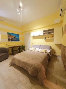 A bed or beds in a room at Tecla House