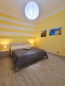 A bed or beds in a room at Tecla House
