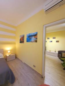 A bed or beds in a room at Tecla House