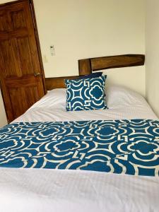Een bed of bedden in een kamer bij Casa Allegria