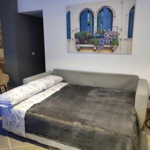Posteľ alebo postele v izbe v ubytovaní Apartamentos Leonor