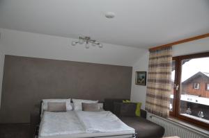 Postel nebo postele na pokoji v ubytování Ferienwohnung Steinhauser