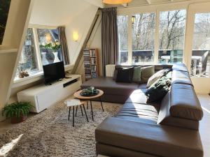 Ruang duduk di 't Egeltje Ardennen chalet 133