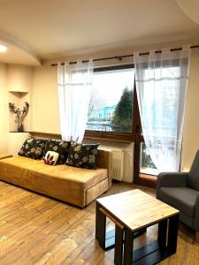 Posedenie v ubytovaní Apartament Marka 2