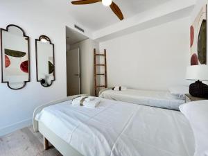 Postel nebo postele na pokoji v ubytování PUSHE Playa Granada Beach & Golf 13