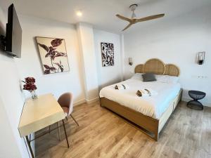 Postel nebo postele na pokoji v ubytování PUSHE Playa Granada Beach & Golf 13