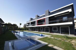 Bazén v ubytování Mali Garden Residence nebo v jeho okolí