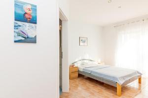 Postel nebo postele na pokoji v ubytování Villa Lavanda