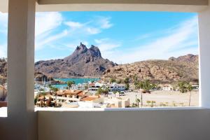 a view of a mountain from a window at Casa Maria Boutique Hotel in San Carlos