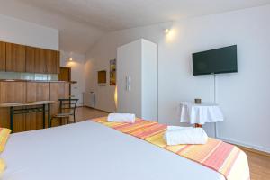 Postel nebo postele na pokoji v ubytování Adria Brela Apartments