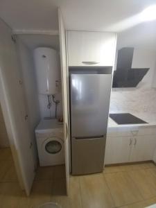 A kitchen or kitchenette at Rosesapparts Gran Via