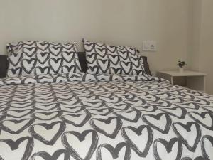 Posteľ alebo postele v izbe v ubytovaní Apartamentos Carrillo 4 Ático