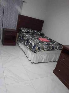 En eller flere senger på et rom på Muhammed Ceesay Villa
