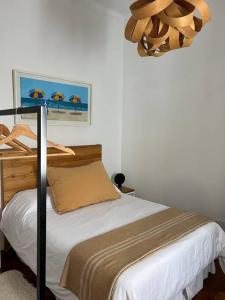 Postel nebo postele na pokoji v ubytování Moderno 2 Ambientes. Ubicación Turística CATALINAS