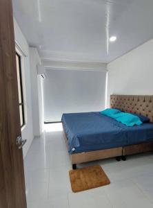 Ein Bett oder Betten in einem Zimmer der Unterkunft Lujosa Mansión Privada estilo mediterráneo