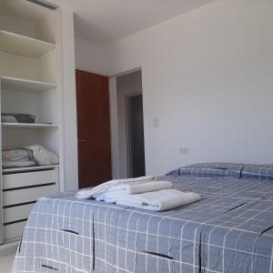 Postel nebo postele na pokoji v ubytování LC 1706 - Dpto. zona Costa del Limay + 2 fotografie