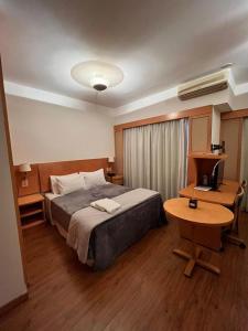 Cama o camas de una habitación en Hotel na Alameda Lorena - Jardins