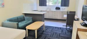 Kuchyň nebo kuchyňský kout v ubytování Hotel Cavalier