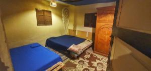 Una cama o camas en una habitación de Dahab house home