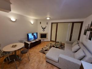 A seating area at Private Chalets Bansko