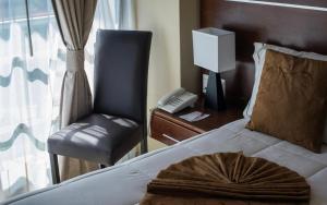 Postel nebo postele na pokoji v ubytování Ivissa Hotel