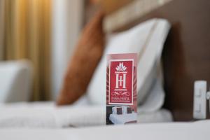 Postel nebo postele na pokoji v ubytování Ivissa Hotel