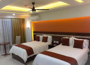 Postel nebo postele na pokoji v ubytování Ivissa Hotel