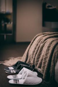 Un pat sau paturi într-o cameră la NOA Hotel & Coffee Xiamen