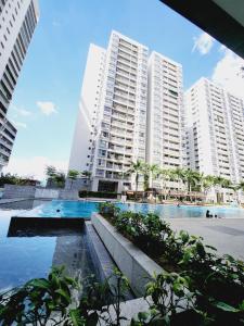 a view of a large apartment building with a swimming pool at SCENIC VALLEY 1 in Ho Chi Minh City