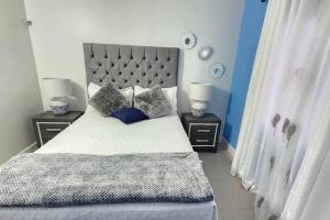 Postel nebo postele na pokoji v ubytování Snooze at Oceanpointe + 9 fotografií