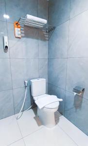 Baðherbergi á Front One Hotel Pasir Koja Bandung