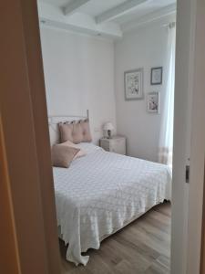 Postel nebo postele na pokoji v ubytování La casetta del nonno