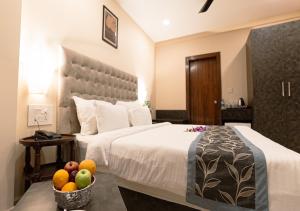 Voodi või voodid majutusasutuse The Verda De Miranda Resort Morjim North Goa toas