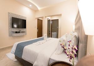 Voodi või voodid majutusasutuse The Verda De Miranda Resort Morjim North Goa toas