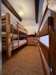 Ένα ή περισσότερα κρεβάτια σε δωμάτιο στο Appartement à Lanslevillard station Val Cenis Vanoise