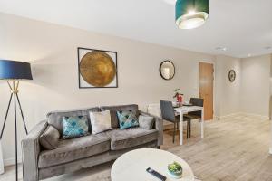 a living room with a couch and a table at Boutique Beautiful Leeds Gem - Sleeps 2 in Leeds