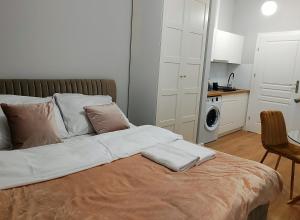 Posteľ alebo postele v izbe v ubytovaní Hugo Star Apartments
