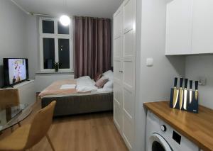 Posteľ alebo postele v izbe v ubytovaní Hugo Star Apartments