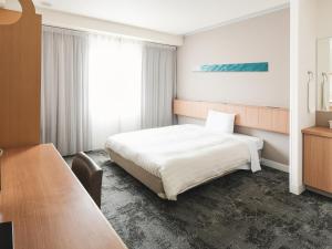 Katil atau katil-katil dalam bilik di Vessel Hotel Ishigakijima
