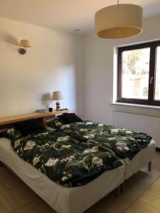 Postel nebo postele na pokoji v ubytování Dom wakacyjny dla 8 osób ok. 120m w Gąski, wybrzeże Morza Bałtyckiego w Polsce