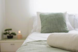 Posteľ alebo postele v izbe v ubytovaní Tisza River Apartman