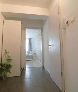 Posteľ alebo postele v izbe v ubytovaní Tisza River Apartman