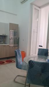 Η κουζίνα ή μικρή κουζίνα στο Happy Home - parcheggio gratuito in box